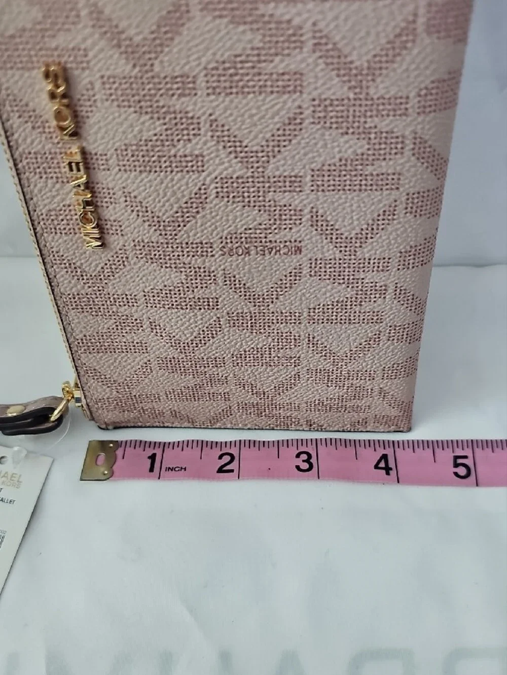 Michael Kors Blush Pink Signature Wristlet with Gold Hardware
